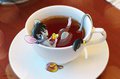 Waiter, There's A Mouse In My Tea by DevoidKiss