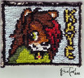 Cross Stitched Kaye Badge by budgiebin